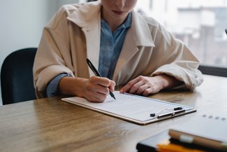 Woman filling out a survey